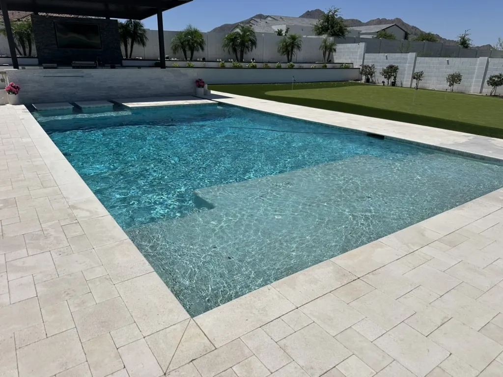 Lap pool with Baja shelf and mountain view