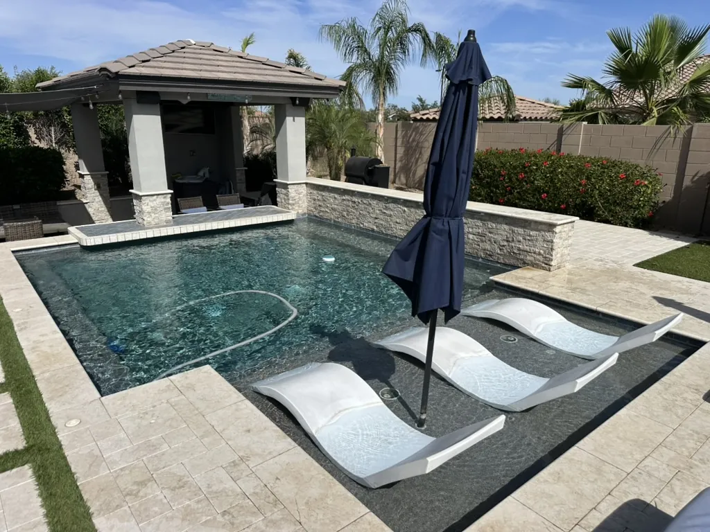 Modern pool with cabana and Baja shelf in Gilbert, AZ
