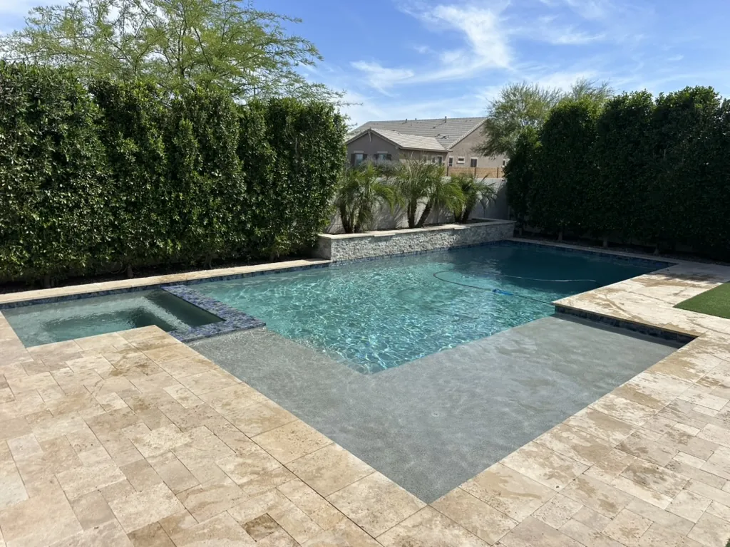 Geometric pool with spa and Baja shelf