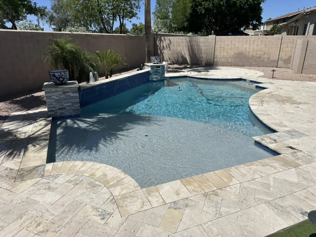 Geometric pool with Baja shelf and desert landscape in Queen Creek, AZ