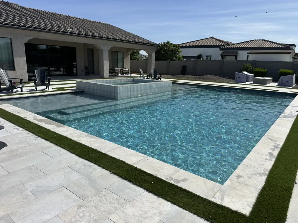 Geometric pool with raised spa and minimalist yard in Queen Creek, AZ